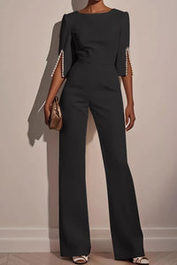 Jumpsuit negro con perlas en las mangas (Nuevo)