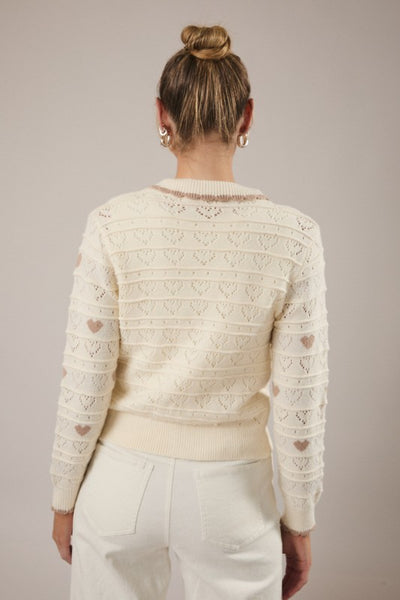 Suéter beige con corazones (Nuevo)