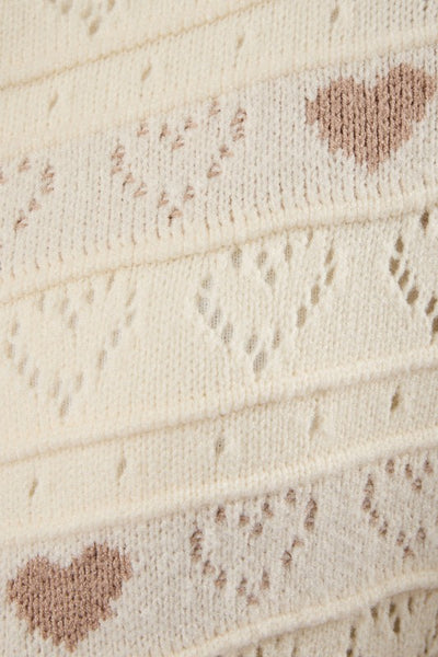 Suéter beige con corazones (Nuevo)
