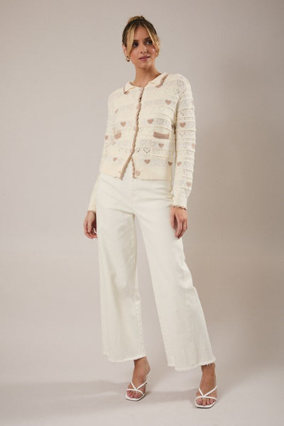 Suéter beige con corazones (Nuevo)