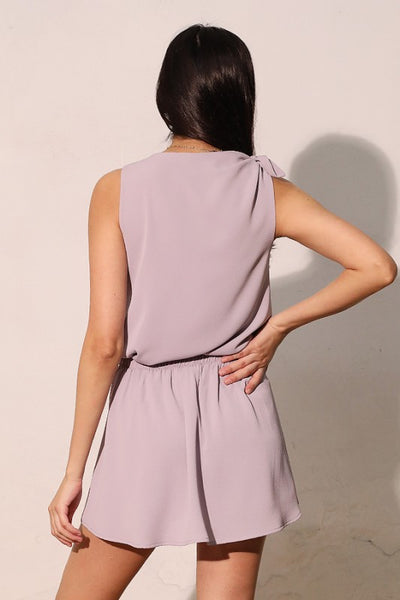 Blusa morada con moño en un hombro (NUEVA)